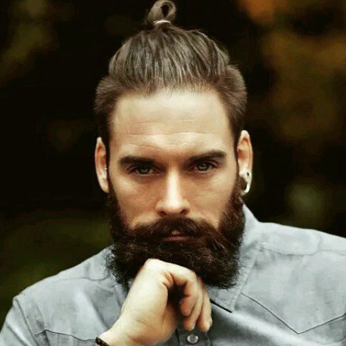 Full beard with a top Knot